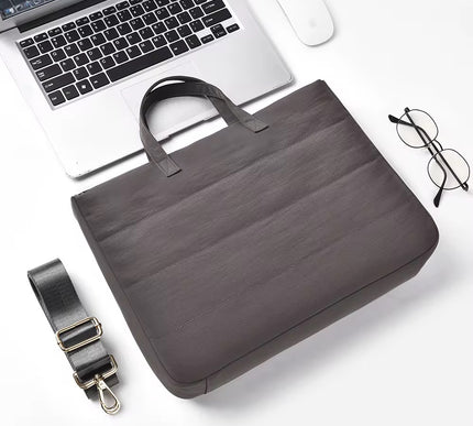 Laptop Sleeve Sleek Style | Multi-Layer Compartments | Water-Resistant Coating | Soft Shockproof Lining | Durable Structure , 15 inch .