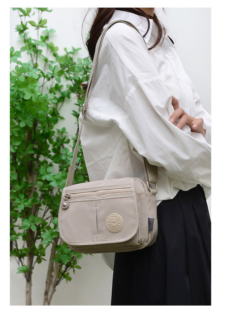 Compact Sling Crossbody Kipling
